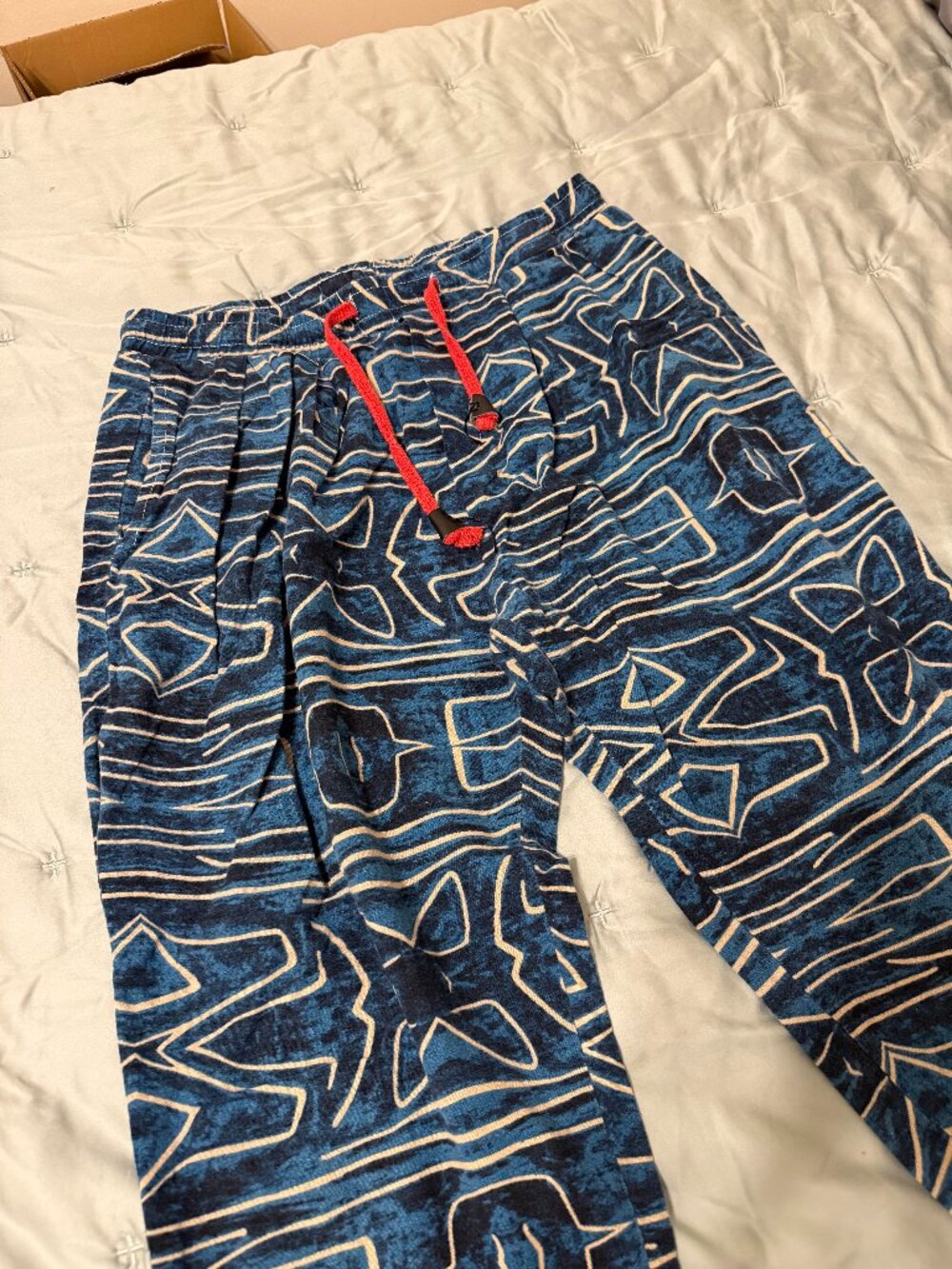 Unisex blue and white geometric patterned pants